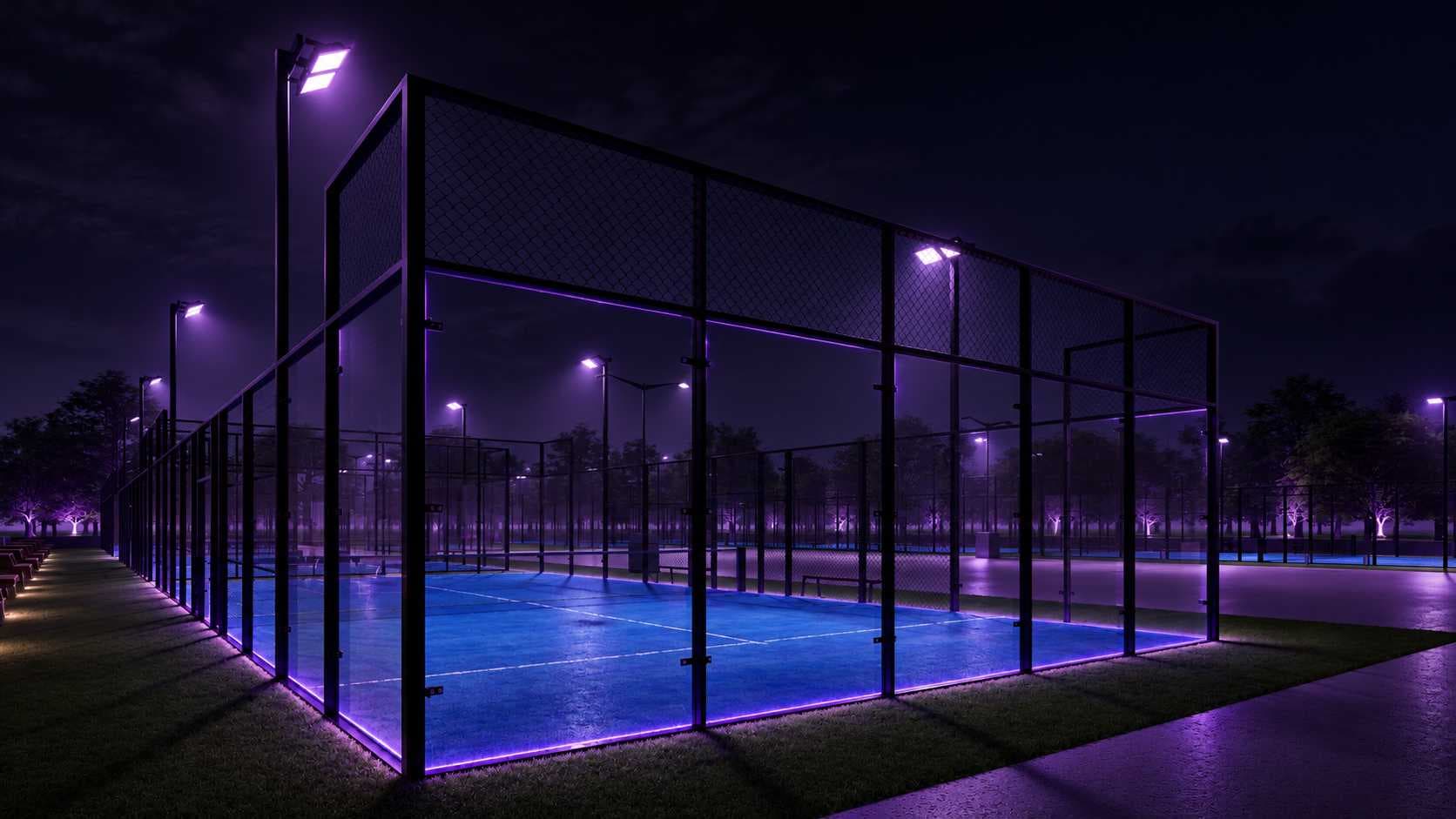 An illuminated padel court in Dubai